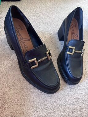 Zodiac Black Leather Heeled Loafers with Gold Buckle